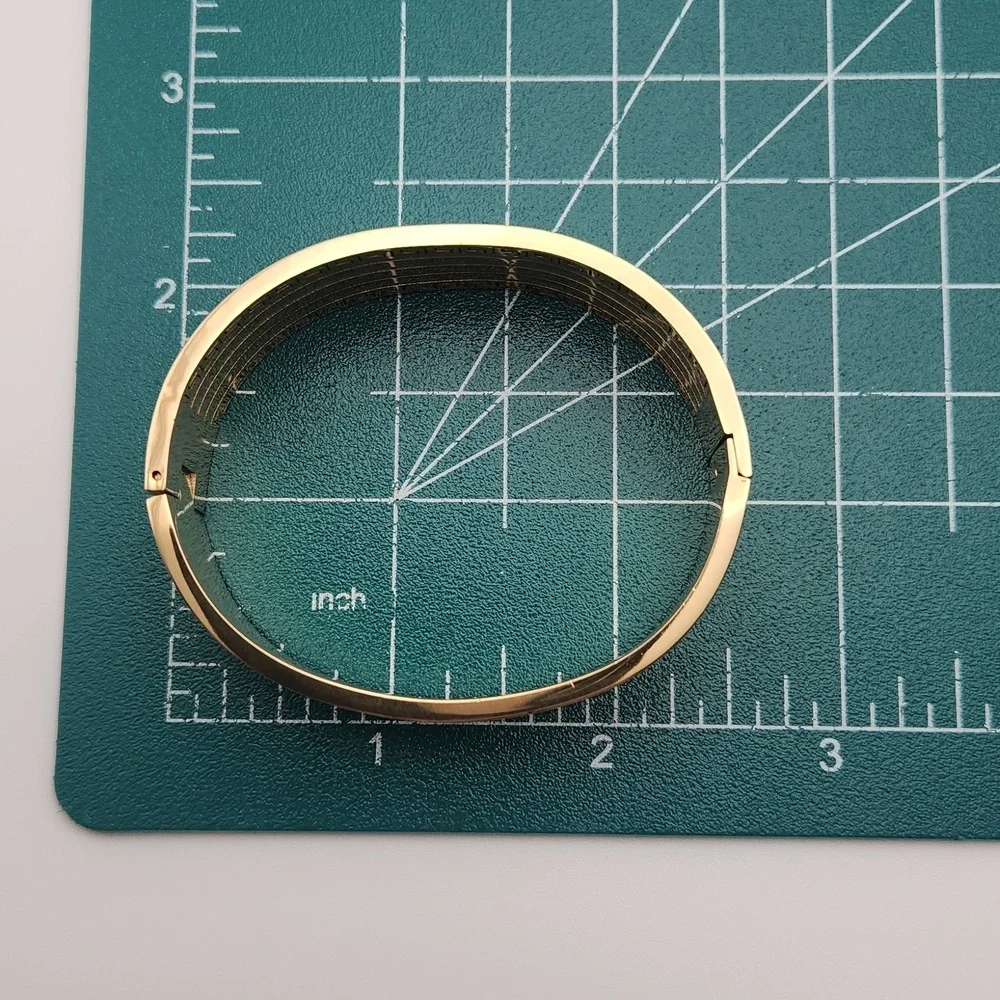 Elegant Gold-Tone Greek Key Bangle Bracelet with Crystal Accents - Picture 5 of 7